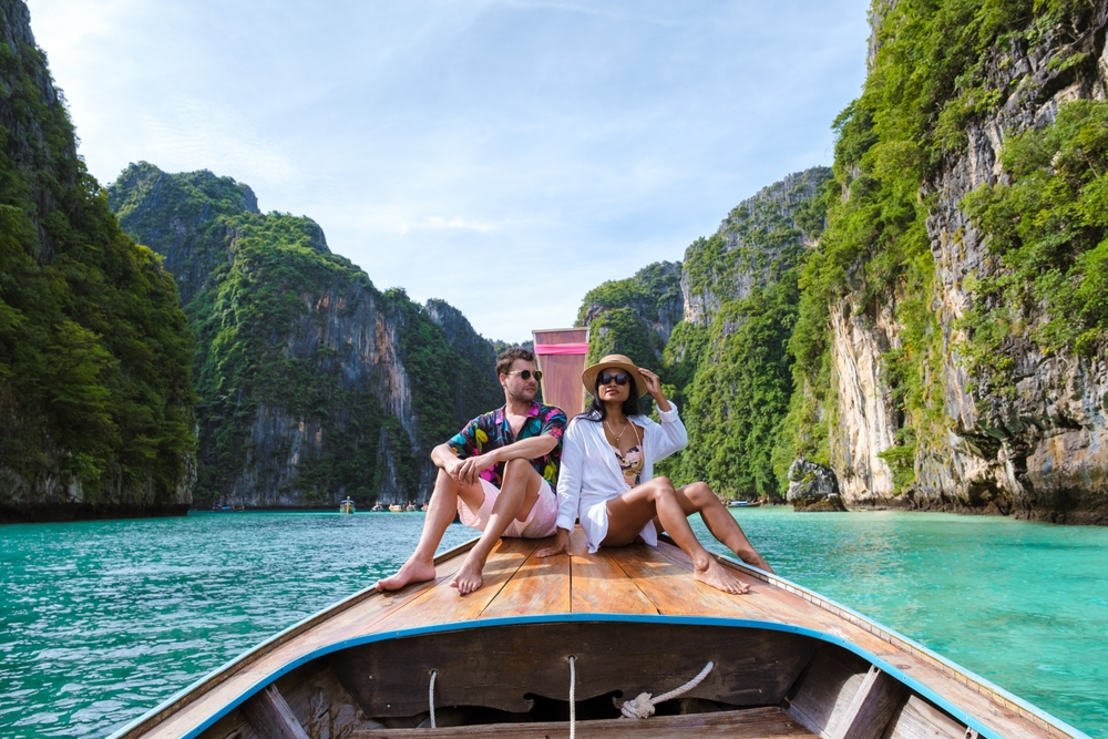 An expat couple living in Phuket, enjoying island hopping 