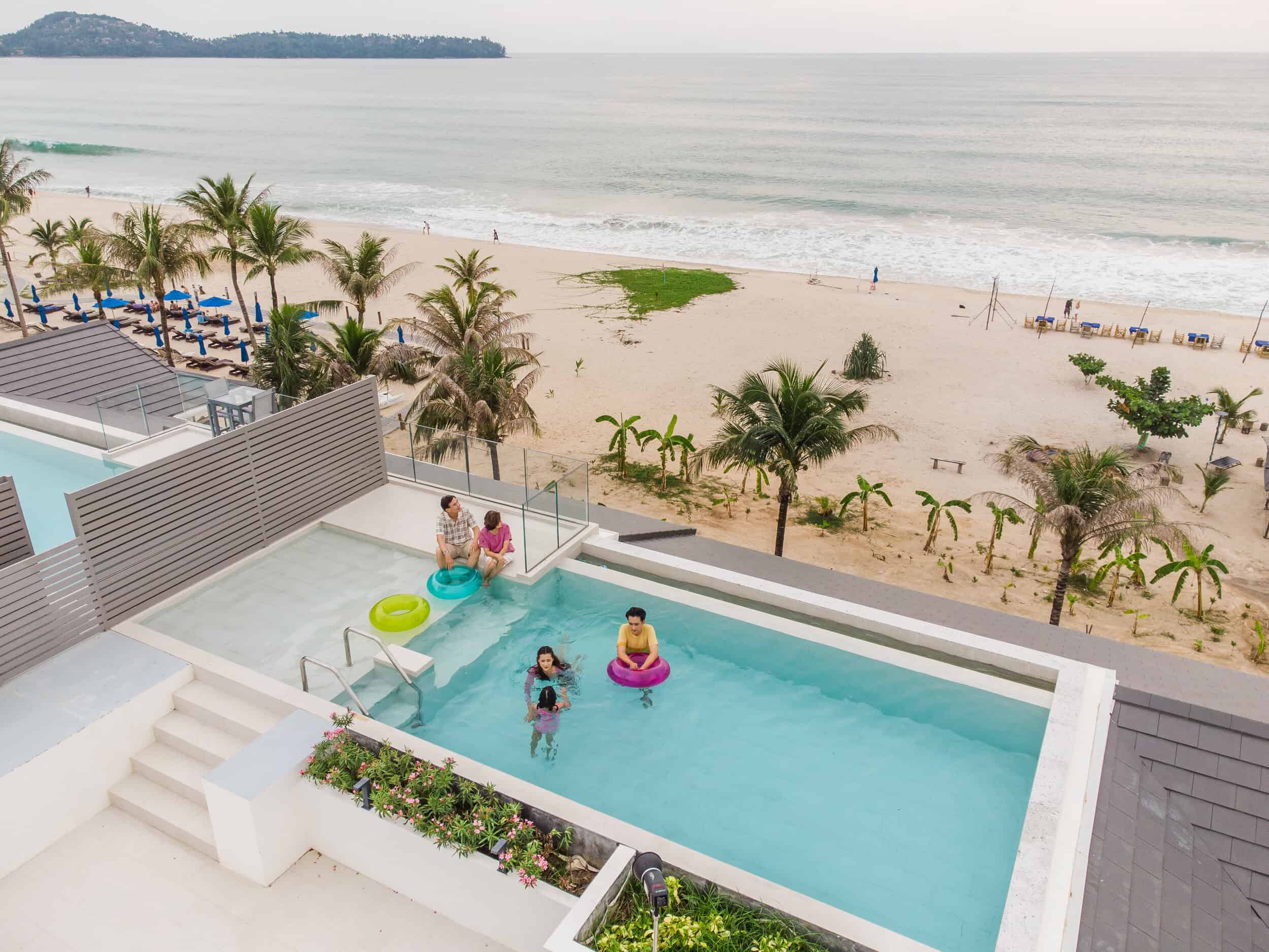 A family enjoying time together at Laguna Phuket, embracing the Laguna Residences lifestyle