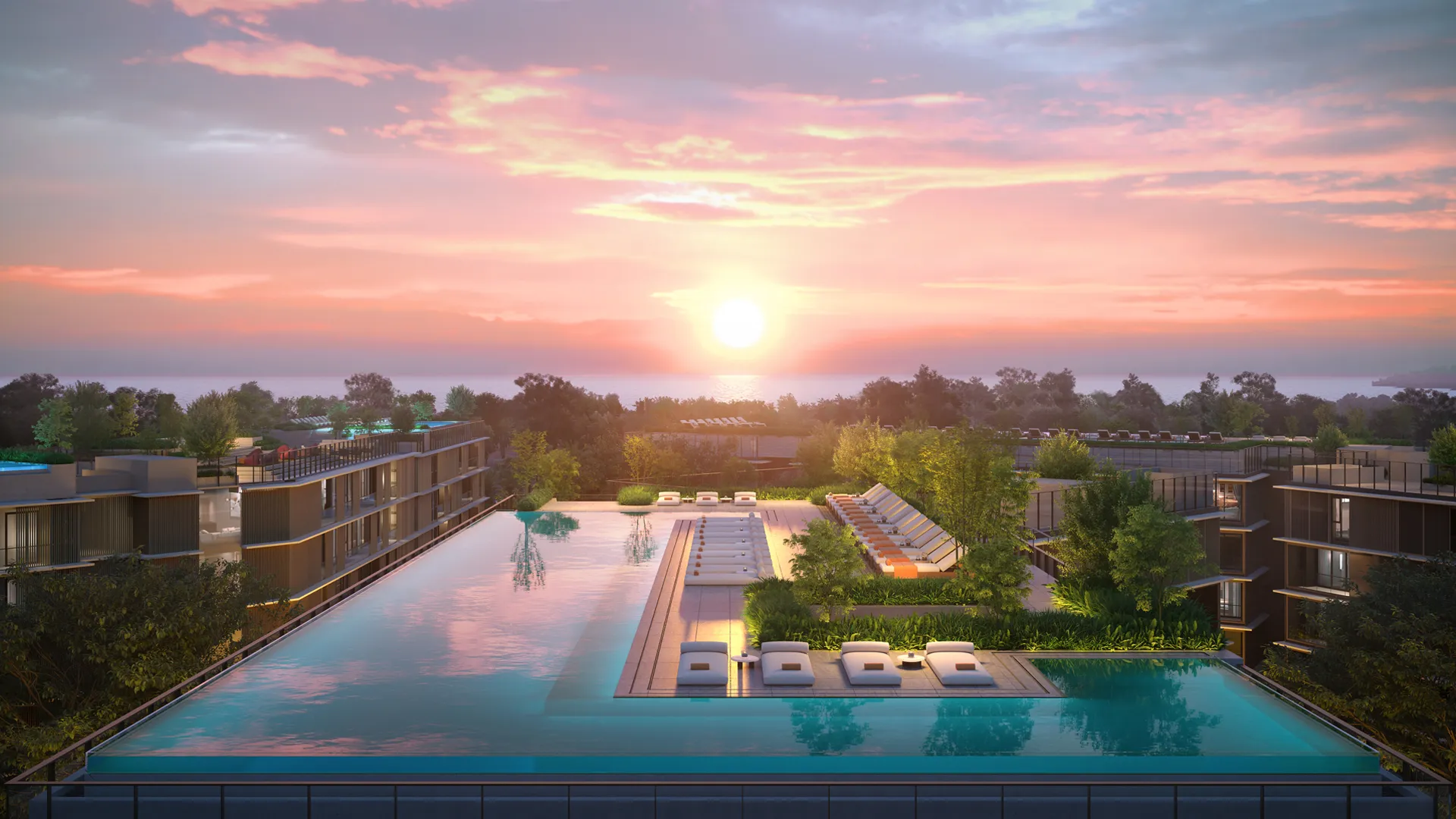 Laguna Lake Residences Aster | A modern building overlooks a tranquil pool and lush garden, with a scenic backdrop of mountains and a lake under a clear blue sky.