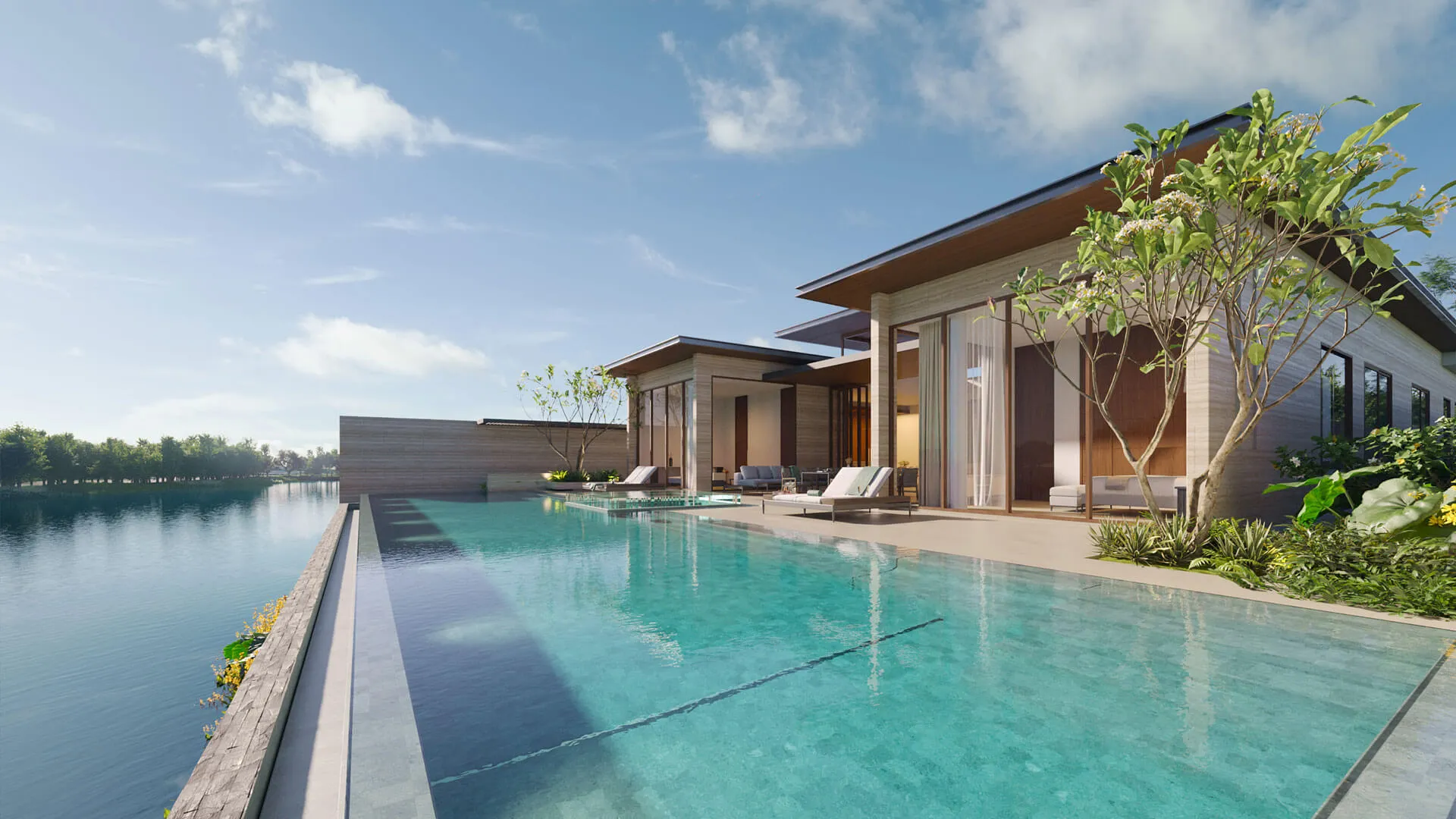 Banyan Tree Lake Residences Yara - Modern house with large windows and patio chairs by an infinity pool overlooking a calm lake, under a clear blue sky.
