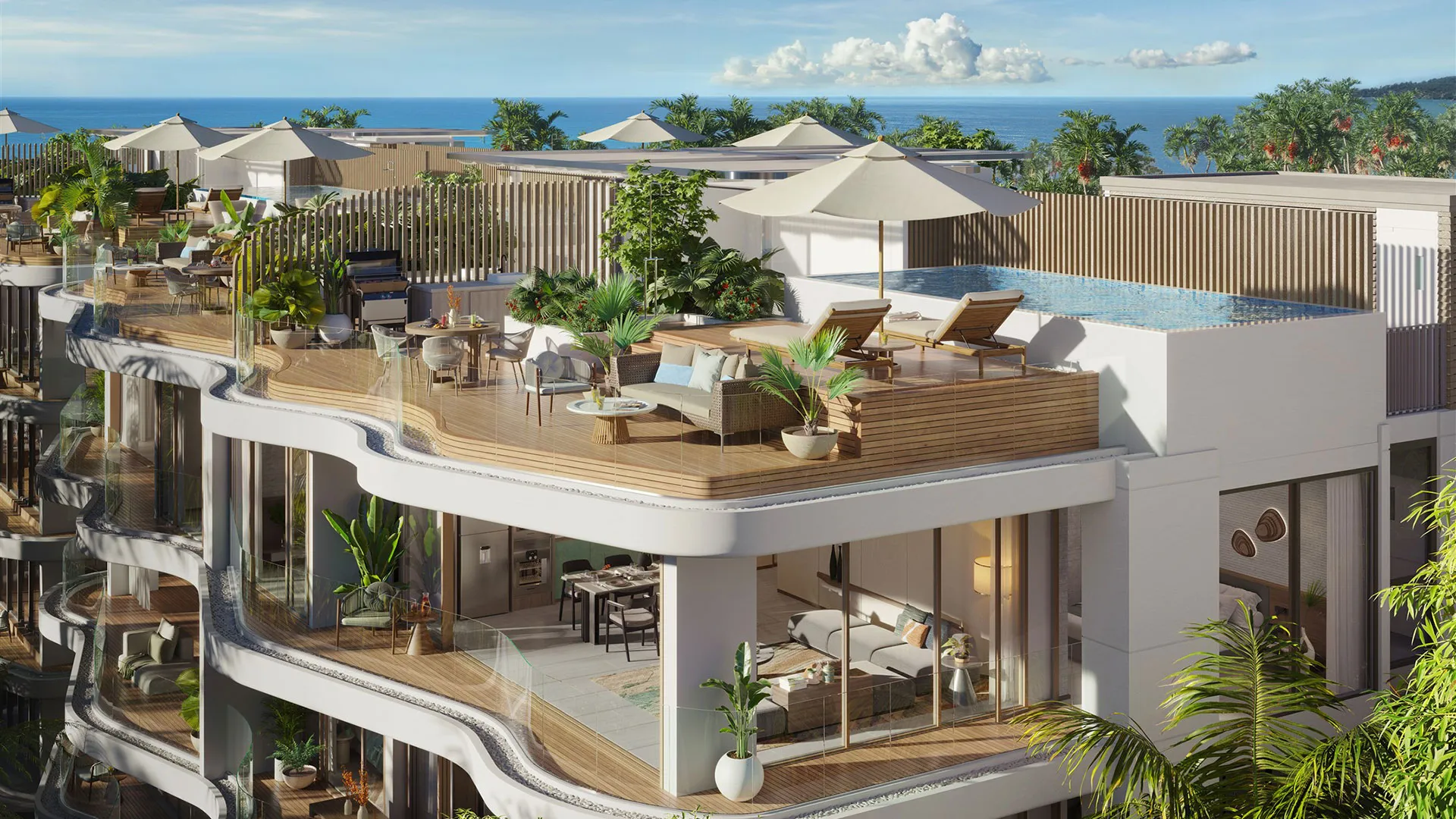 Residences at Garrya Phuket - A multi-level terrace with sun loungers and umbrellas, overlooking the sea.